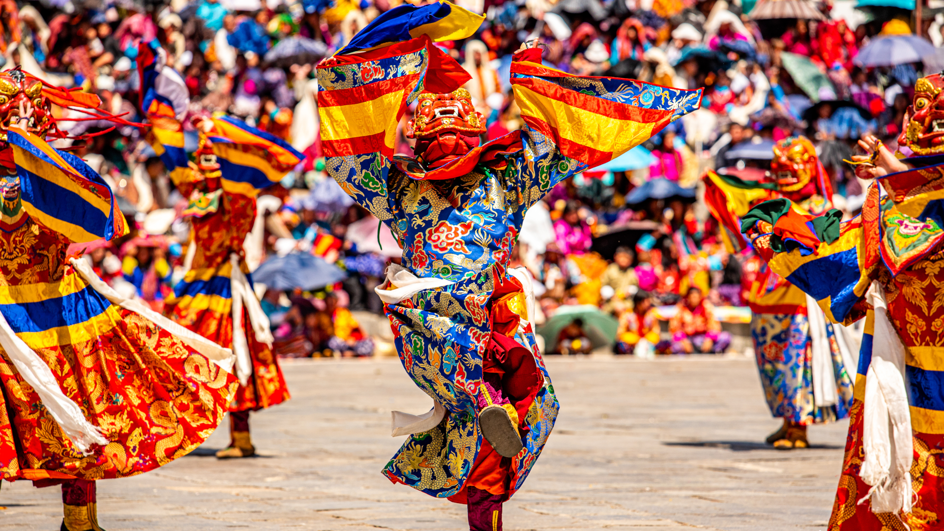 Thimphu Tshechu festival with masked dancers in Bhutan