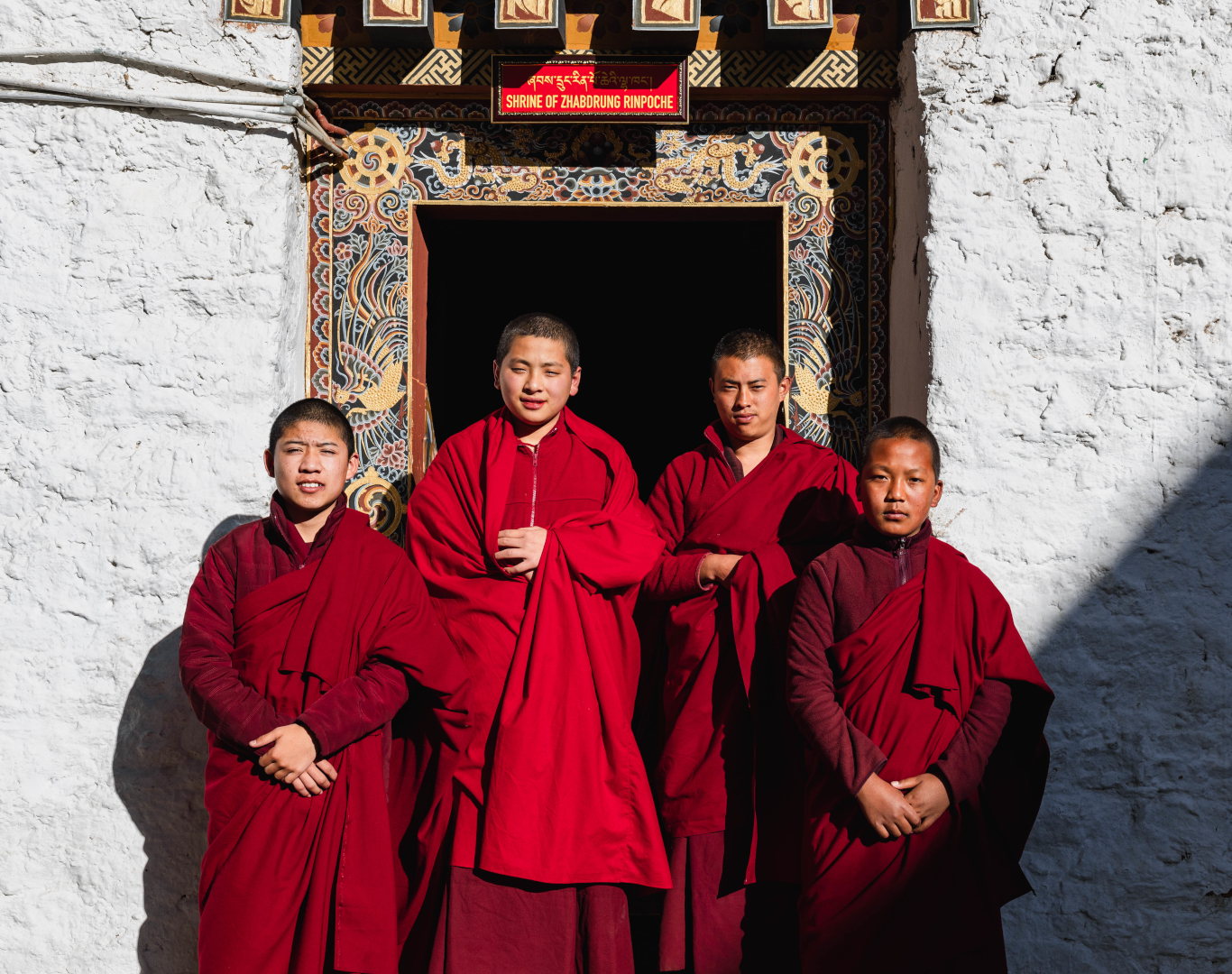 Buddhist monks in Bhutan wearing traditional robes